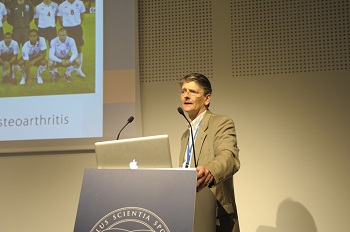 Prof Mark Batt speaking at football conference